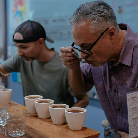 Two Men Tasting Coffee